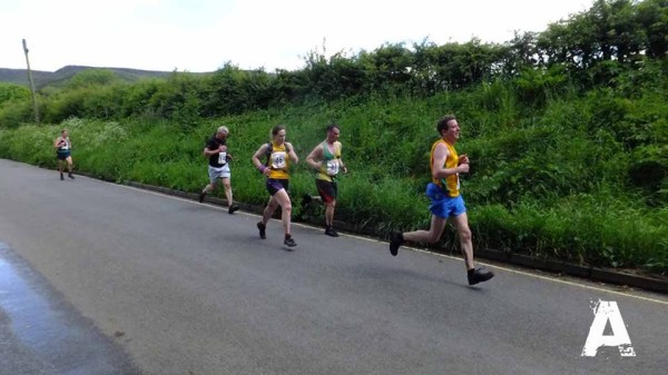 John Rawlinson, Matthew Zawadzki and Jeni Pitkin on the final stretch of the Edale Fell Race.